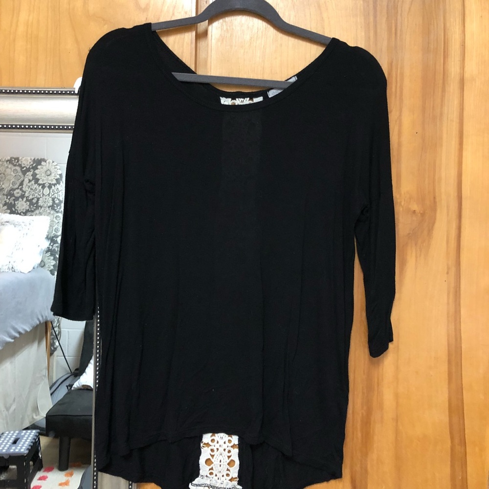 black top with lace detailing on the back